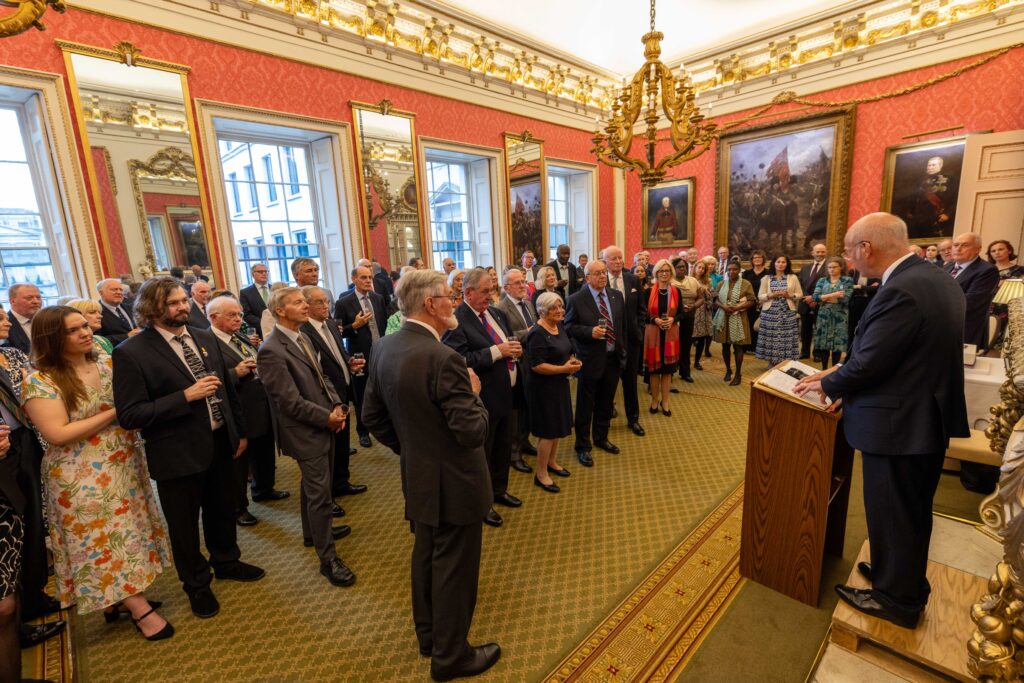 The Offices Association is marking a significant transition as it prepares to integrate with Lady Grover’s Fund, a historic and trusted support network for officers’ families. This move reflects a shared commitment to providing comprehensive care and financial support, particularly in times of illness or recovery. The 2025 reception serves as the Association’s final gathering under its current name, offering members a moment to celebrate its legacy while looking ahead to a strengthened future within Lady Grover’s Fund. Through this merger, the community will gain access to expanded benefits and a wider support system, ensuring continued care for those who serve and their families.